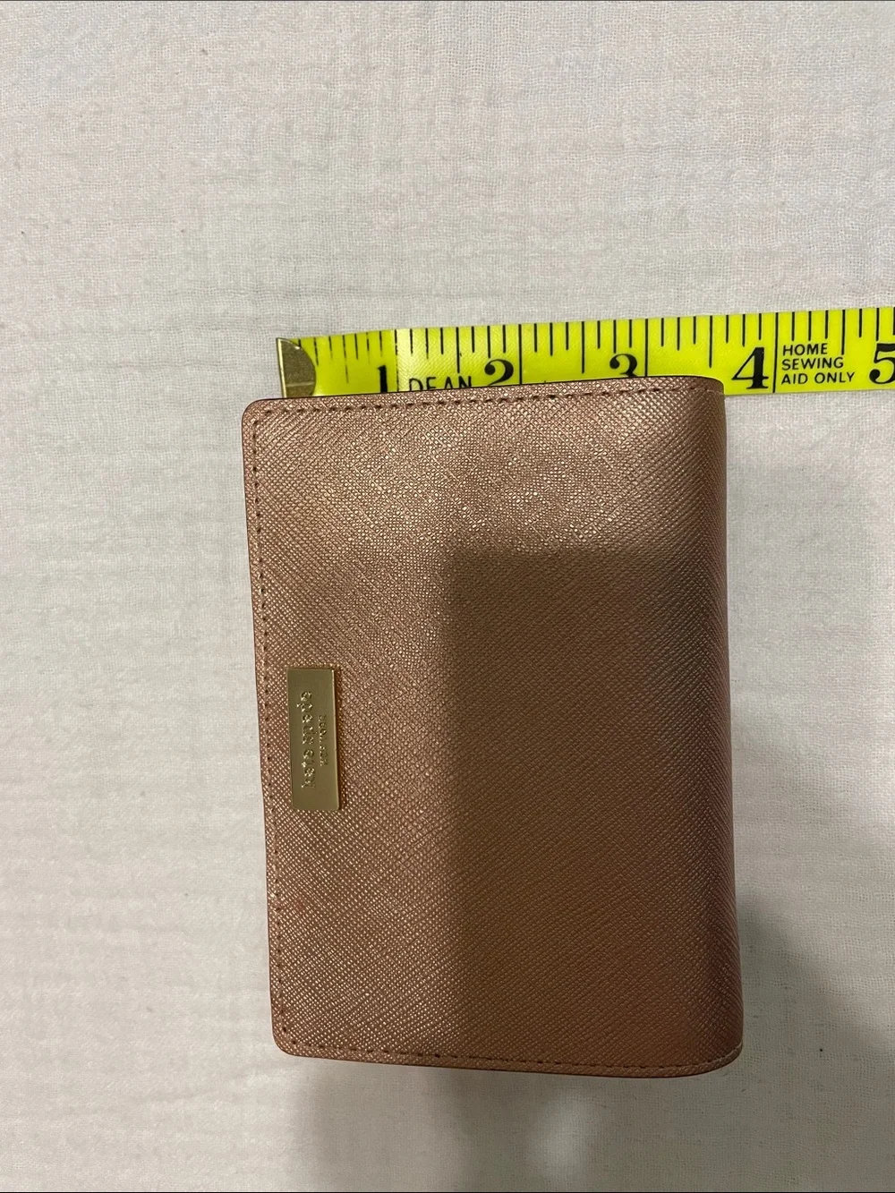 kate spade metallic rose gold compact cardholder